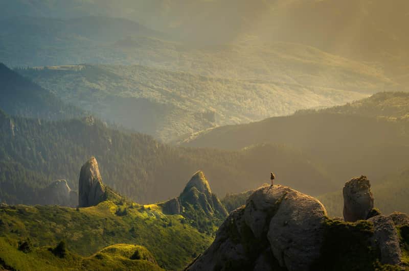 Sunlight breaking over a mountain landscape